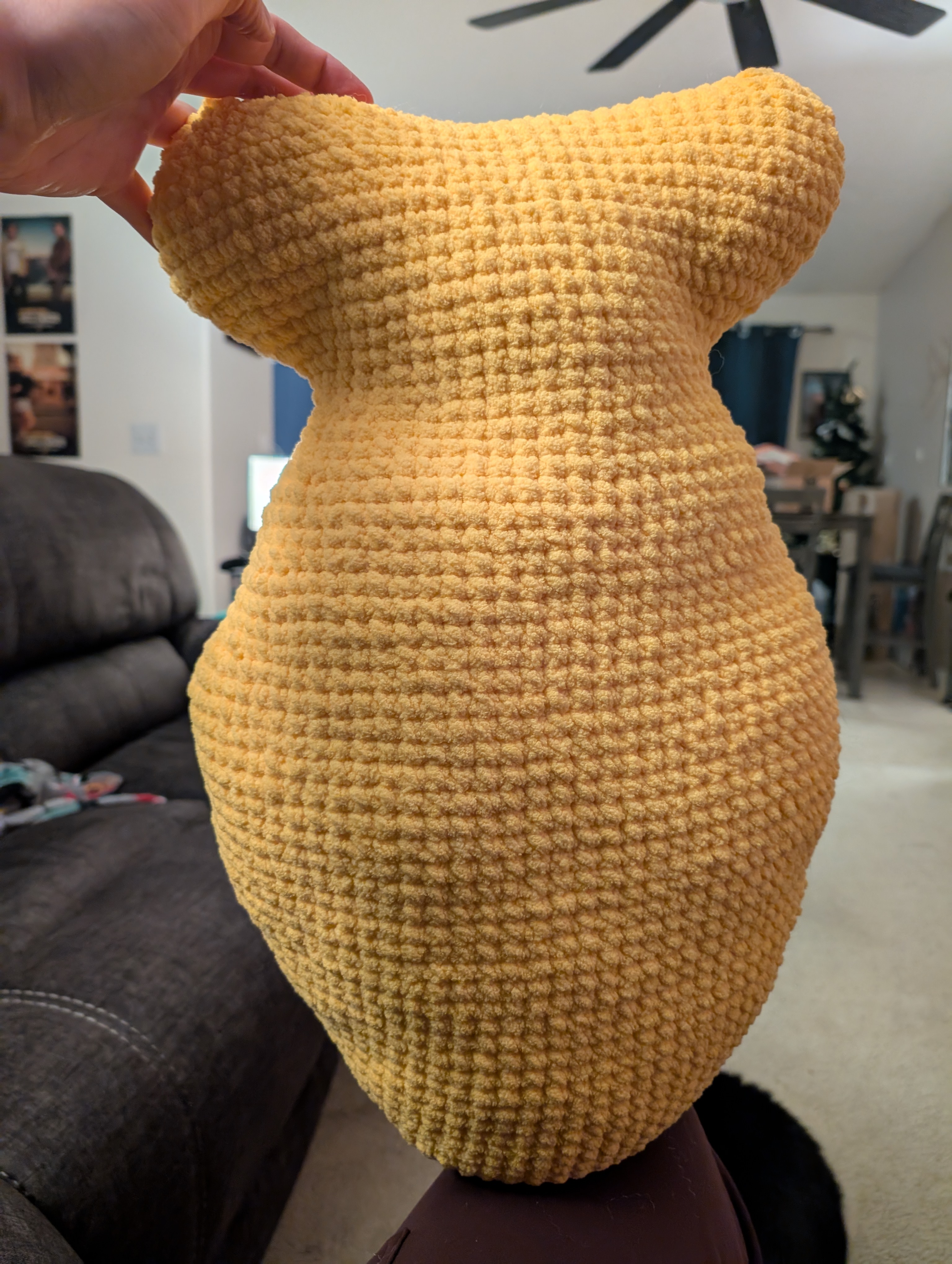 picture of a crochet jumbo goldfish in the color yellow