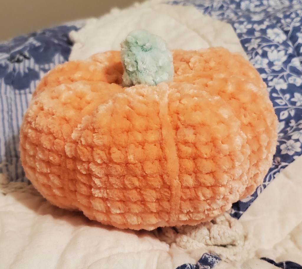 a picture of a crochet pumpkin